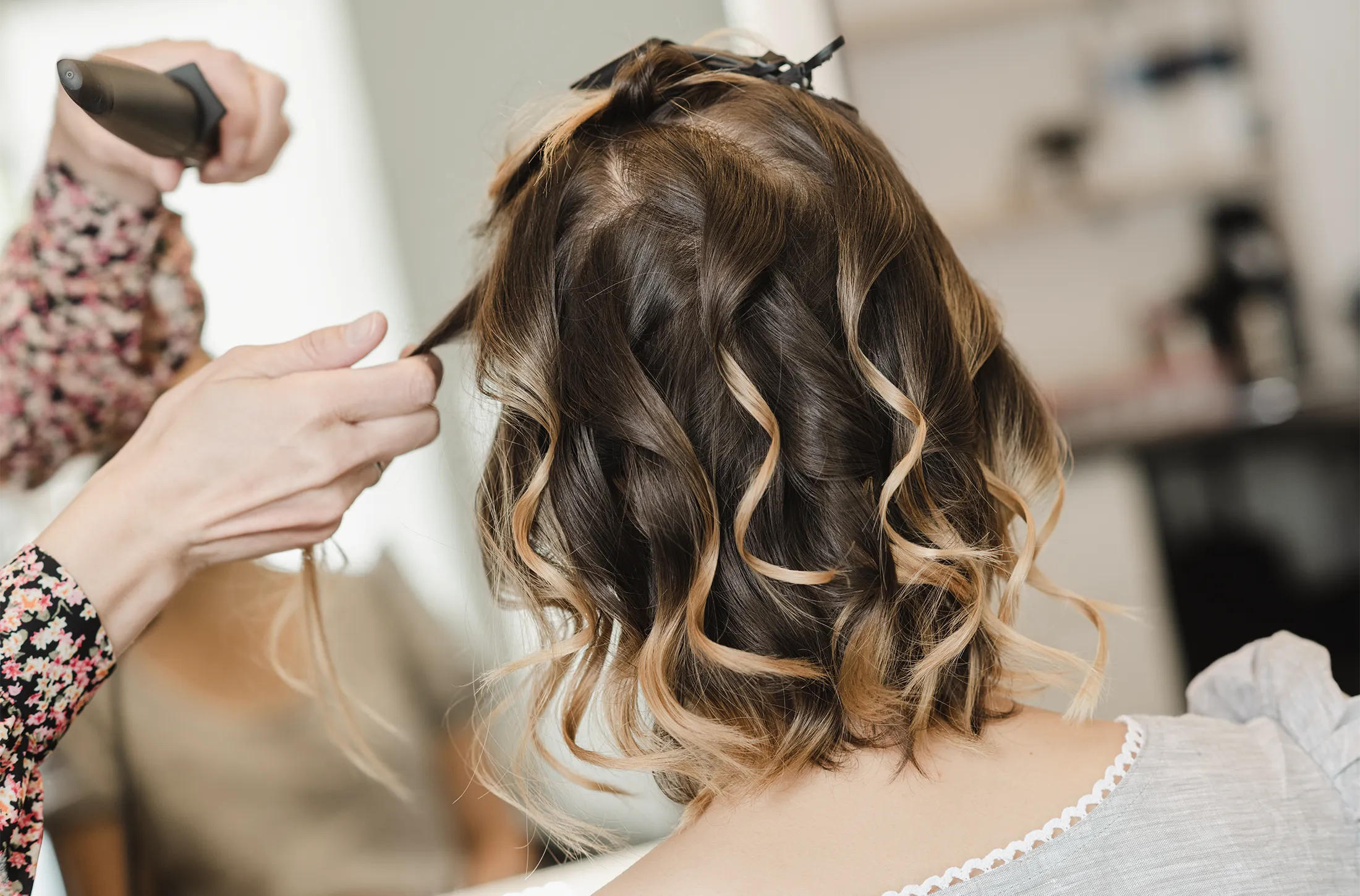 Friseur Heiligenhaus – Stylen einer Haarfrisur mit dem Glätteisen